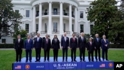 President Joe Biden and leaders from the Association of Southeast Asian Nations (ASEAN) participate in a group photo on the South Lawn of the White House in Washington, Thursday, May 12, 2022. (AP Photo/Susan Walsh)
