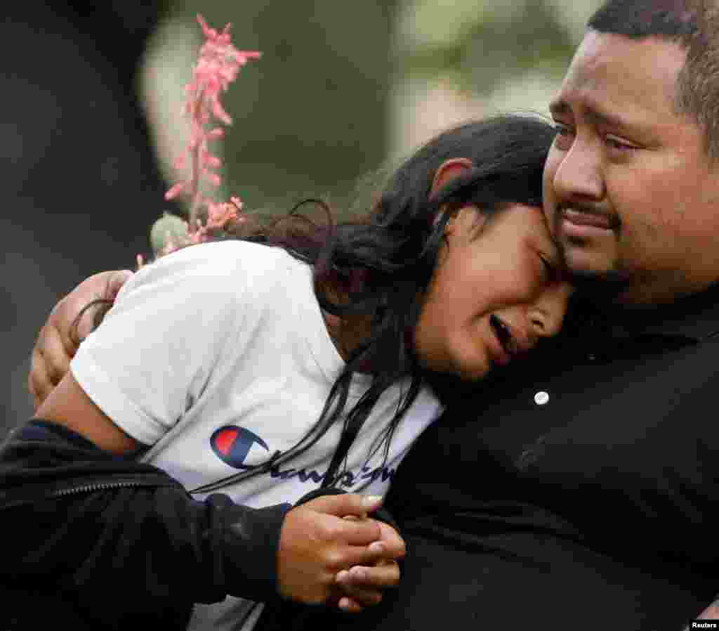 People react outside the Ssgt Willie de Leon Civic Center, where students had been transported from Robb Elementary School after a shooting, in Uvalde, Texas, May 24, 2022. A teenage gunman killed 19 children and two teachers. All of the victims were in a fourth-grade classroom, officials said.