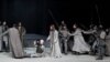 Frederik Mayet as Jesus (C) and ensemble members perform during a rehearsal at Oberammergau's Passion Play theatre in Oberammergau, southern Germany on May 4, 2022. 