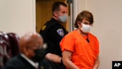 FILE - Payton Gendron is led into the courtroom for a hearing at Erie County Court, in Buffalo, New York, USA, May 19, 2022.