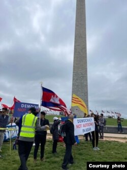 Demonstrators rally around the National Mall area in Washington, D.C to call for democratic practices from Southeast Asian countries