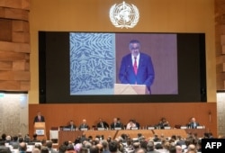 FILE - World Health Organization (WHO) Director-General Tedros Adhanom Ghebreyesus delivers a speech on the opening day of 75th World Health Assembly of the WHO, in Geneva, Switzerland, May 22, 2022.