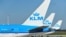 Dutch Airline KLM said it is taking the action to guarantee seats for customers whose flights had been cancelled due to the long security lines at Schiphol. 