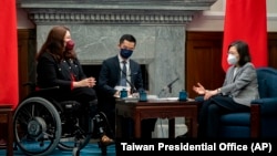 U.S. Sen. Tammy Duckworth, D-Ill., left, meets with Taiwan's President Tsai Ing-wen at the Presidential Office in Taipei, May 31, 2022.
