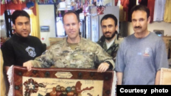 Najeebullah (R) and Colonel Stuart Farris are seen in Afghanistan during Operation Enduring Freedom, 3rd Special Forces Group, 2011. (Courtesy - Najeebullah)