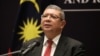 FILE - Malaysia's Foreign Minister Saifuddin Abdullah speaks during a news conference after ASEAN Summit in Kuala Lumpur, Malaysia, Oct. 28, 2021.