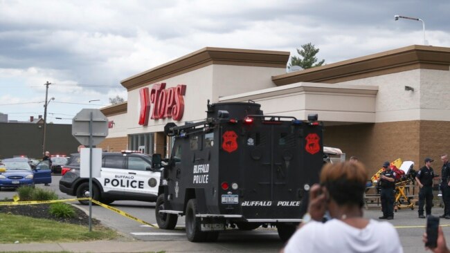 Multiple people were shot, May 14, 2022, in Buffalo, New York, at the Tops Friendly Market. Police said they have a suspect in custody.
