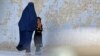 Afghan Women Defiant but Feel 'Imprisoned' by Order to Cover Faces  