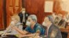 In this courtroom sketch, former Honduran President Juan Orlando Hernandez, center, speaks into a microphone while pleading not guilty to drug trafficking and weapons charges, May 10, 2022, in New York.