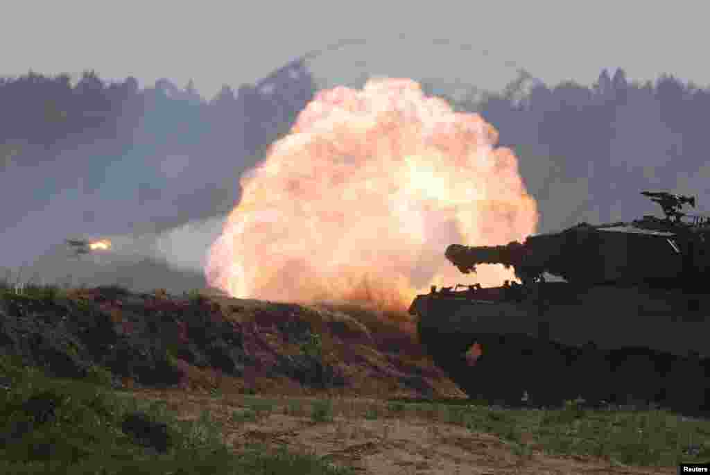 A Polish Leopard 2PL tank fires during Defender Europe 2022 military exercise of NATO troops including French, American, and Polish troops&nbsp;at the military range in Bemowo Piskie, near Orzysz, Poland, as the Russian invasion of Ukraine continues.