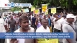 VOA60 World - Hundreds in Sri Lanka defy curfew to continue months-long protests