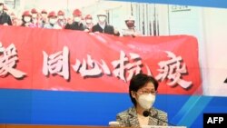 Kepala Eksekutif Hong Kong Carrie Lam berbicara dalam konferensi pers di kantor pusat pemerintah di Hong Kong, 9 Maret 2022. (Foto: AFP)