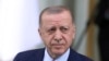 FILE - Turkish President Recep Tayyip Erdogan arrives for a welcoming ceremony for his Algerian counterpart, Abdelmadjid Tebboune, in Ankara, Turkey, on May 16, 2022. Erdogan is taking an increasingly tough line against the NATO membership bids of Finland and Sweden.