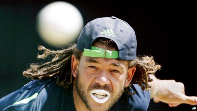 FILE - Australia's Andrew Symonds bowls in the nets during a traiing session on April 15, 2007, at the National Stadium at St. George's, Grenada.