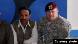 Najeebullah (L) and Chief Warrant Officer 3 Jason Coombs are seen in Afghanistan during Operation Enduring Freedom. (Courtesy - Jason Coombs)