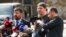 FILE - Mykhailo Podolyak, adviser to Ukrainian President Volodymyr Zelenskyy and member of the Ukrainian delegation, center right, speaks to the media after talks between Russian and Ukrainian delegations, in Istanbul, March 29, 2022. 