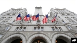 FILE - The Trump Organization said in May 2022 that it had completed the sale of rights to run the Trump International Hotel, 1100 Pennsylvania Ave. NW in Washington, to CGI Merchant Group of Miami.