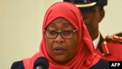 FILE Tanzanian President Samia Suluhu Hassan addresses after swearing-in ceremony as the country's first female President after the sudden death of President John Magufuli at statehouse in Dar es Salaam, Tanzania on March 19, 2021.