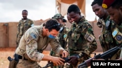 FILE - US forces host a range day with the Danab Brigade in Somalia, May 9, 2021.