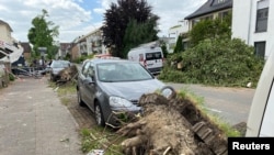 Broken trees, branches and debries are pictured in the aftermath of a suspected tornado that swept through the town of Paderborn, Paderborn, Germany, May 21, 2022.