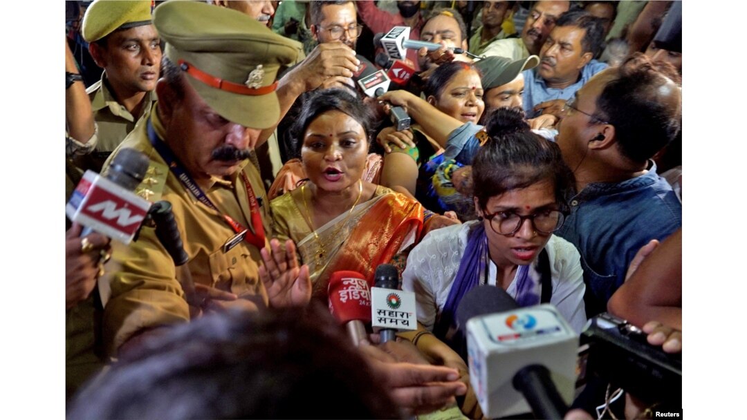 Rakhi Singh, Sita Sahu and Laxmi Devi, three of the five petitioners who filed a plea to pray every day before the idol of a goddess and relics inside the Gyanvapi mosque, speak with the media after they leave the mosque in Varanasi, India, May 14, 2022.