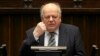 FILE - Then-speaker of the Belarusian parliament Stanislav Shushkevich addresses a session of the Polish parliament during a visit to Warsaw, Feb. 25, 2011.