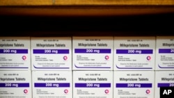 Boxes of the drug mifepristone line a shelf at the West Alabama Women's Center in Tuscaloosa, Ala., on March 16, 2022.