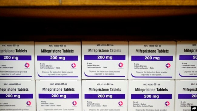 Boxes of the drug mifepristone line a shelf at the West Alabama Women's Center in Tuscaloosa, Ala., on March 16, 2022.
