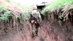 Ukrainian Troops Patrol Trenches on Donetsk Frontline 