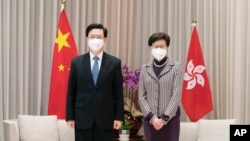 香港行政长官林郑月娥与特首当选人李家超会面。(2022年5月9日)