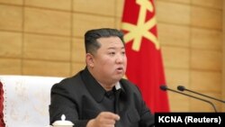 North Korean leader Kim Jong Un attends a Worker's Party meeting on coronavirus disease (COVID-19) outbreak response in this undated photo released by North Korea's Korean Central News Agency (KCNA) on May 15, 2022. 