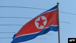 FILE - The North Korean flag flies at the country's embassy compounds in Kuala Lumpur, March 19, 2021.