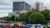 Emergency personnel work at the scene of a shooting at the Natalie Medical Building in Tulsa, Okla., June 1, 2022. 