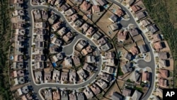 FILE — An aerial view of a housing development in Tucson, Arizona.