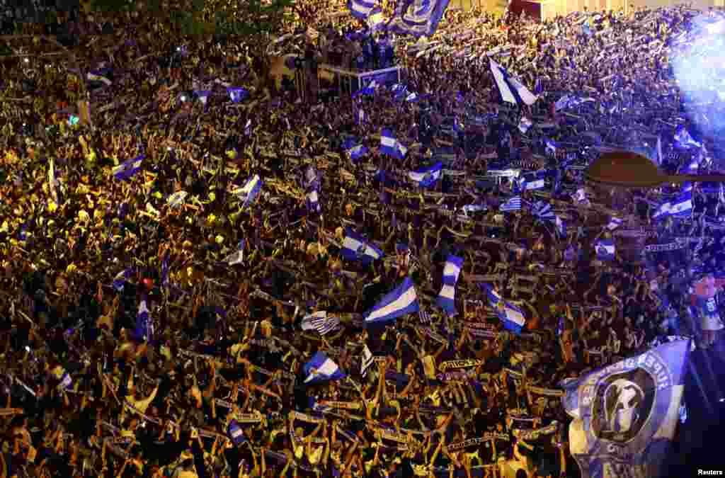 FC Porto fans celebrate after winning the Portugese League at the Luz Stadium in Lisbon, Portugal, May 7, 2022.