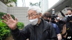 FILE - Catholic Cardinal Joseph Zen leaves after an appearance at a court in Hong Kong, May 24, 2022. He was charged in relation to past fundraising for activists.