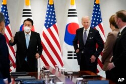 US President Joe Biden speaks during a news conference with South Korean President Yoon Suk Yeol at the People's House, May 21, 2022, in Seoul.