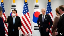 US President Joe Biden speaks during a news conference with South Korean President Yoon Suk Yeol at the People's House, May 21, 2022, in Seoul.