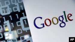 This March 23, 2010, file photo shows the Google logo at the Google headquarters in Brussels, Belgium. (AP Photo/Virginia Mayo, File)