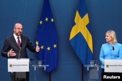 European Council President Charles Michel and Sweden's Prime Minister Magdalena Andersson give a joint news conference in Stockholm, Sweden, May 25, 2022.