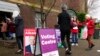 Voters walk into a pre-polling booth in Sydney, May 20, 2022. 