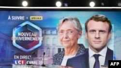 A general view shows the studio set with the images of France's Prime Minister Elisabeth Borne and French President Emmanuel Macron prior to Borne taking part in the evening news broadcast of French TV channel TF1 on May 20, 2022.