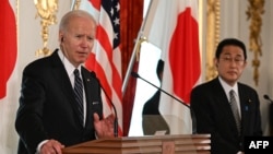 FILE - U.S. President Joe Biden (left) and Japanese Prime Minister Fumio Kishida hold a press conference at Tokyo's Akasaka Palace on May 23, 2022.