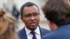 France's Education and Youth Minister Pap Ndiaye speaks during a visit to College du Bois d'Aulne in Conflans Sainte Honorine, northwest of Paris on May 23, 2022.