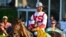 Jose Ortiz, atop Early Voting, parades in the winner's circle after winning the 147th running of the Preakness Stakes horse race at Pimlico Race Course, May 21, 2022, in Baltimore.