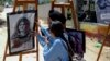 نمایشگاه هنری گرامی‌داشت شیرین ابوعاقله، خبرنگار فلسطینی-آمریکایی الجزیره، در شهر جنین در کرانه باختری رود اردن - ۲۸ خرداد ۱۴۰۱
