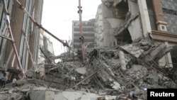 General view at the site of a ten-storey building collapse in Abadan, Iran May 23, 2022. 