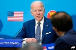 FILE - President Joe Biden participates in the U.S.-ASEAN Special Summit to commemorate 45 years of U.S.-ASEAN relations at the State Department in Washington, Friday, May 13, 2022.