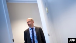 FILE - Rob Malley, President Joe Biden's top Iran negotiator, poses in his office in Washington, May 7, 2018, when Malley was CEO at the International Crisis Group.