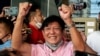 Philippine presidential candidate Ferdinand 'Bongbong' Marcos Jr., son of late dictator Ferdinand Marcos, greets his supporters at his headquarters in Mandaluyong City, Metro Manila, May 11, 2022. 